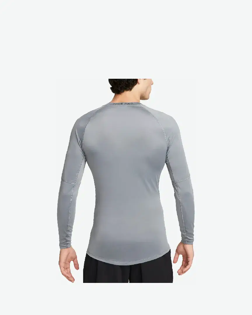 Tee-Shirt À Manches Longues Nike M Np Df Tight Top Ls M - FB7919-084 (1) au meilleur prix !