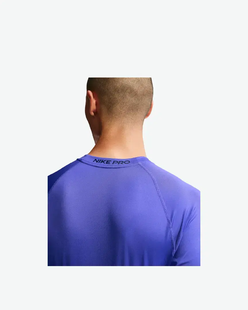 Tee-Shirt Nike Pro Dri-Fit M - FB7932-510 (1) au meilleur prix !